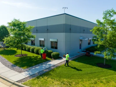 commercial maintenance technicians mowing warehouse 3